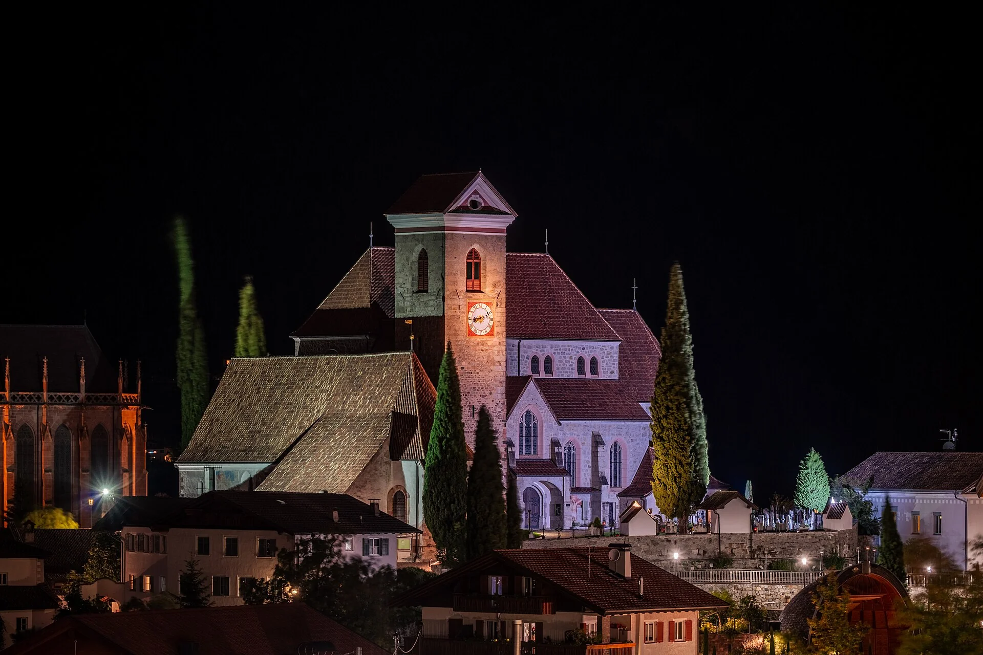 The church of Santa Maria Assunta in Schenna lit up at night