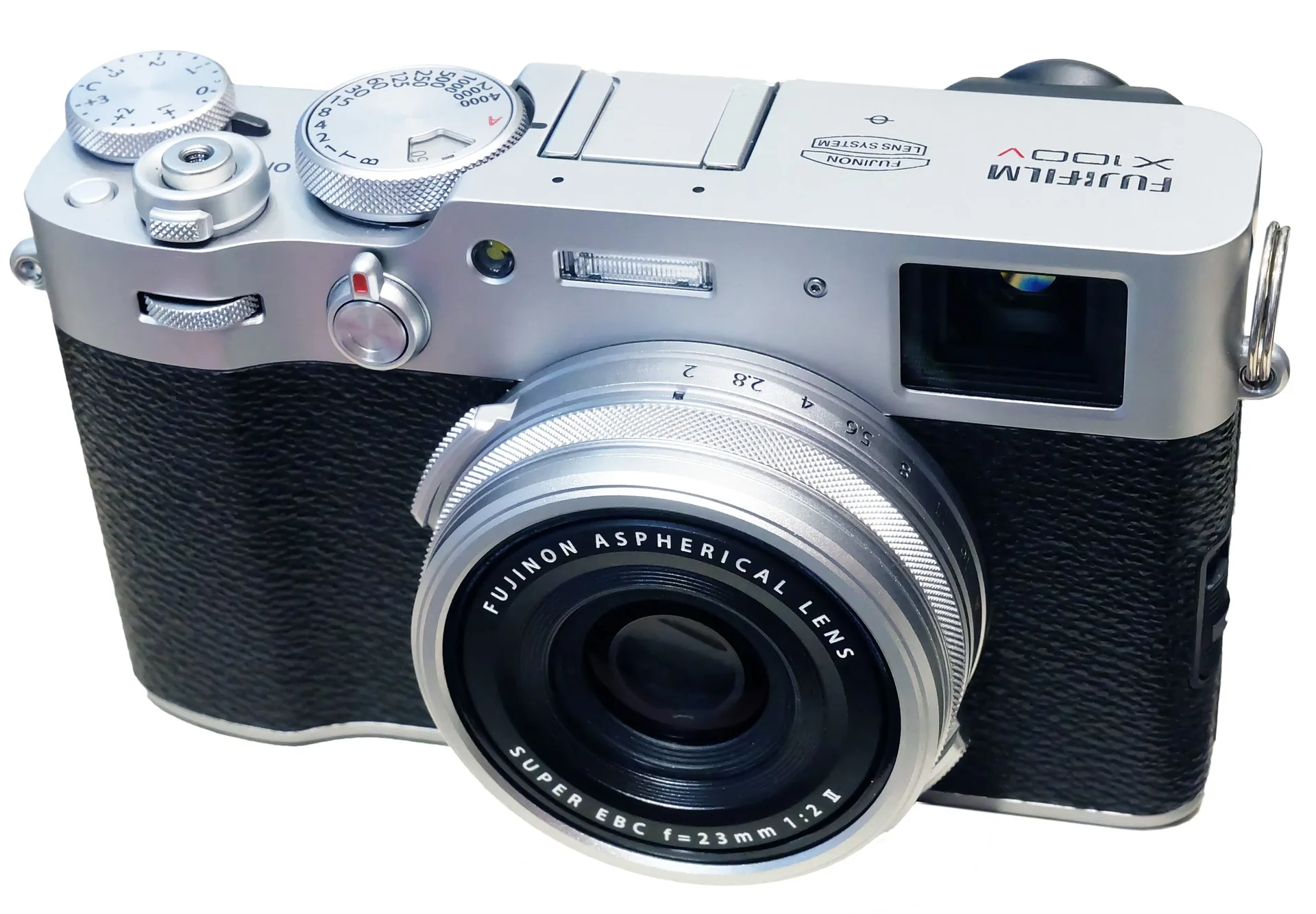 A silver Fujifilm X100V compact camera with its fixed 23mm lens on a white background