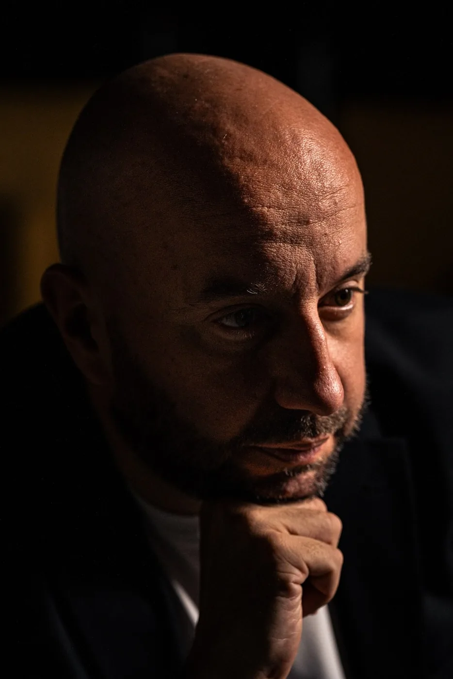 A low-key studio portrait of Bojan Stanimirovic