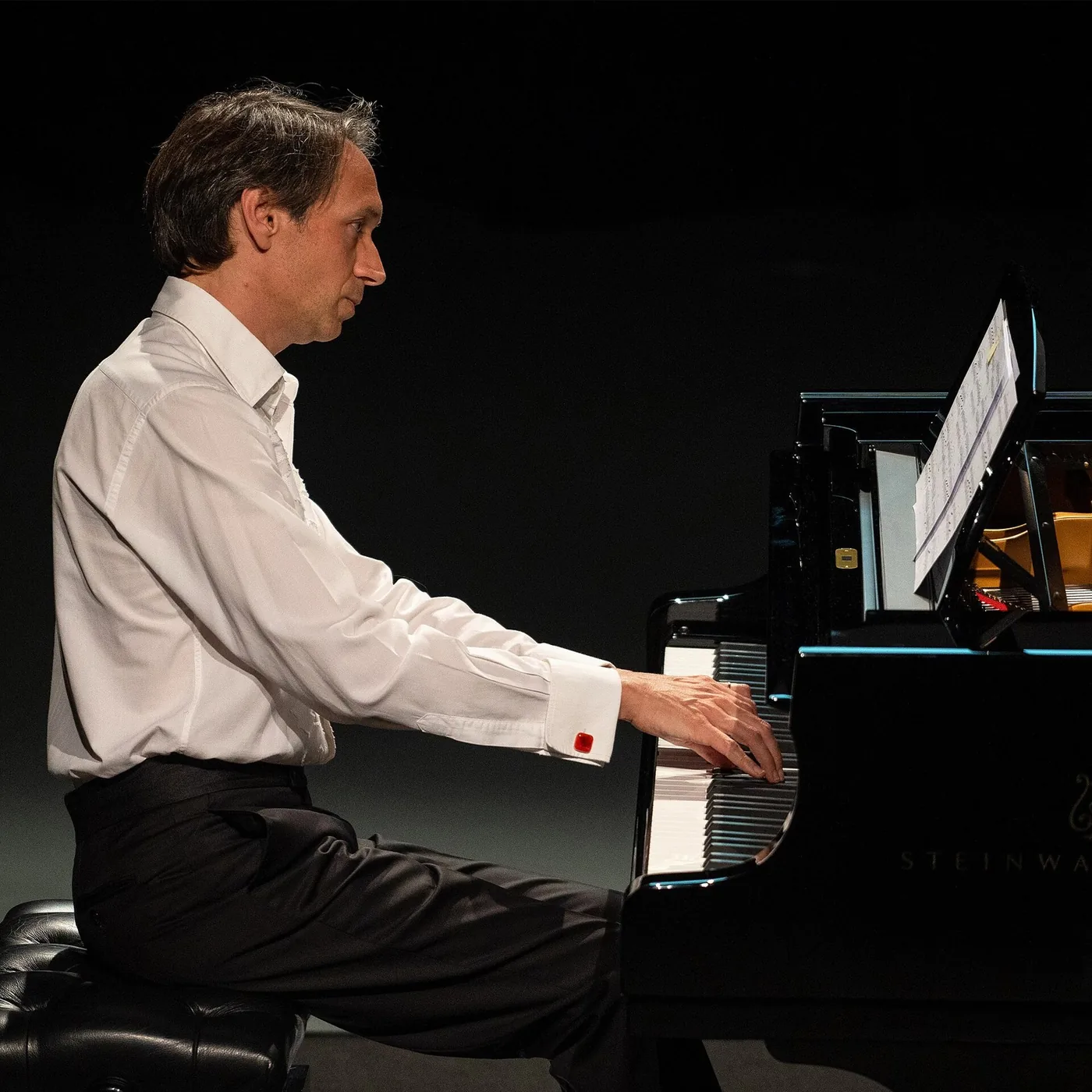 Pianist Guillaume Coppola at the piano in concert