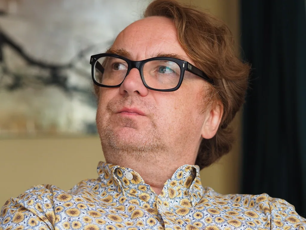 A man with glasses, head portrait