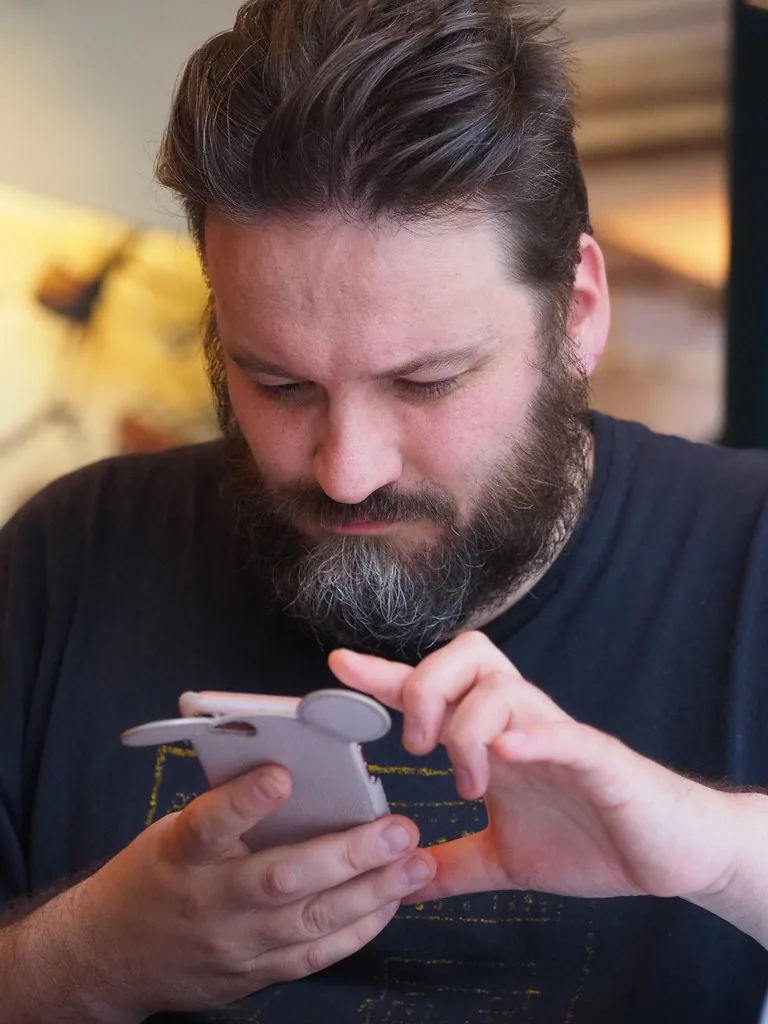 A man looking at his phone